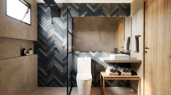 Banheiro do Studio Superior com ducha, revestimento espinha de peixe azul e bancada